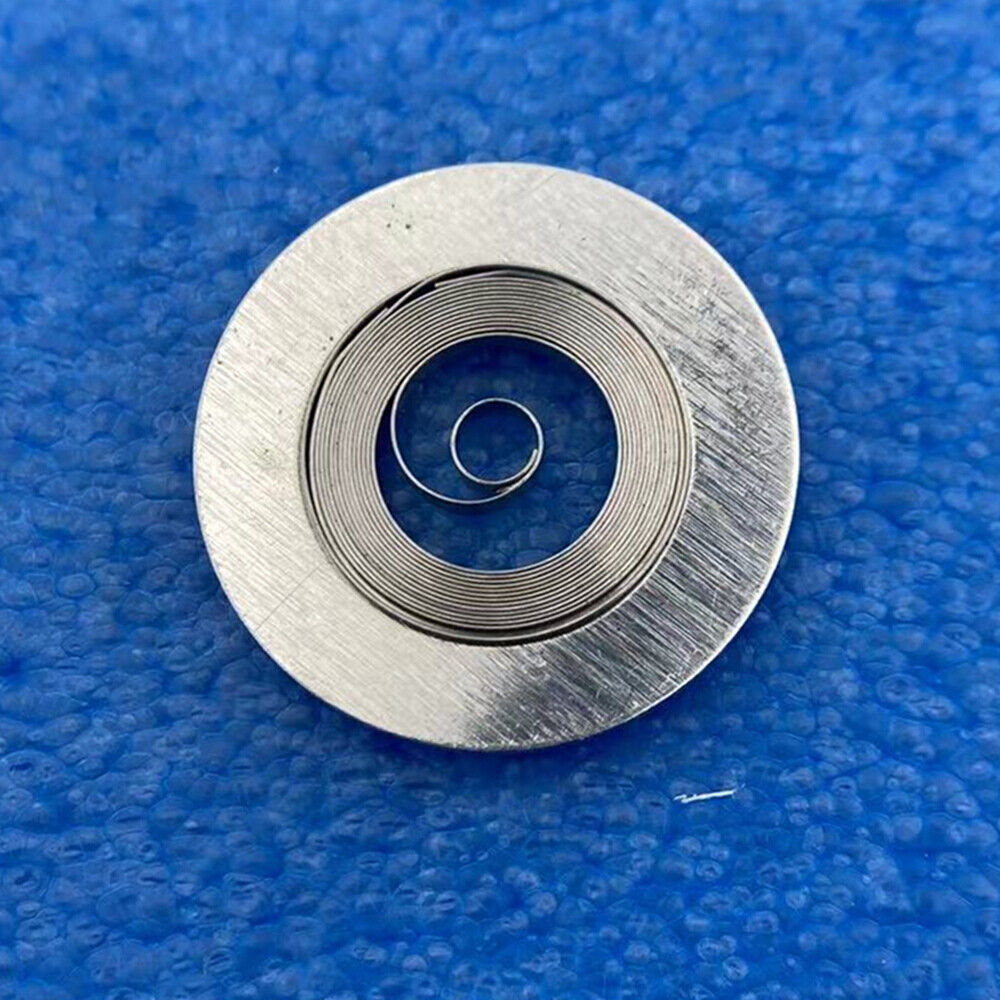 Complete mainspring and barrel for China Made 2824 watch movement, compatible with generic parts.