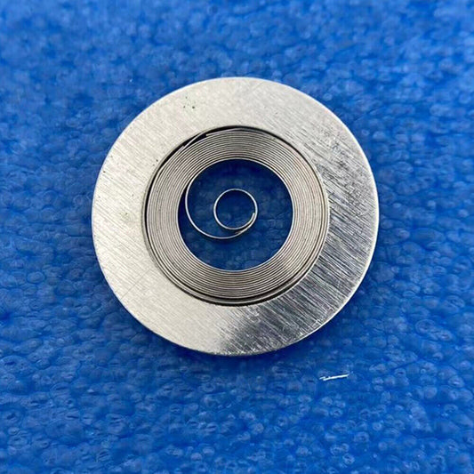 Complete mainspring and barrel for China Made 2824 watch movement, compatible with generic parts.