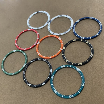 White font 39mm aluminum bezel insert with circular arc bevel for precise watch customization.