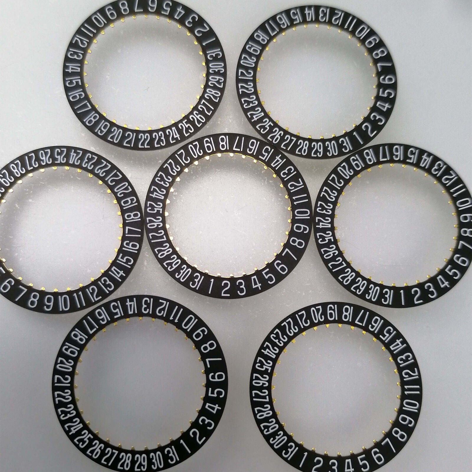 Generic Date@6 black date disk wheel for ETA2824-2 watch movement, precise replacement part.