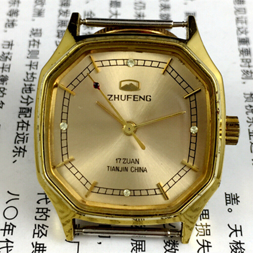 Octagonal golden dial manual mechanical watch by Tianjin Factory, classic design for elegant style.