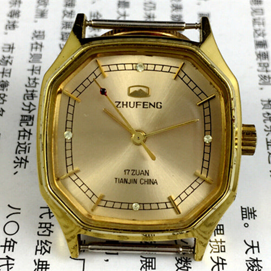 Octagonal golden dial manual mechanical watch by Tianjin Factory, classic design for elegant style.