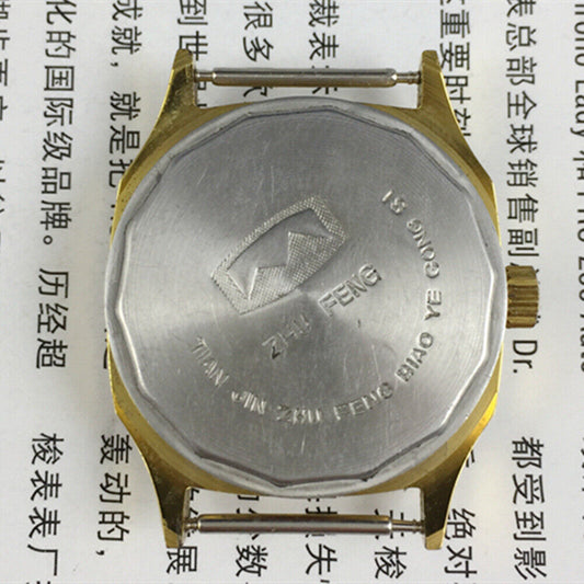Octagonal golden dial manual mechanical watch by Tianjin Factory, classic design for elegant style.