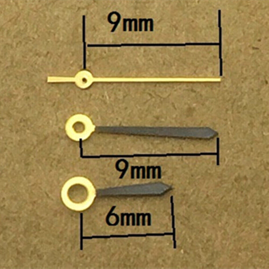 Black polished golden pointed watch hands for Ronda 763 quartz movement, sleek and precise accessory.