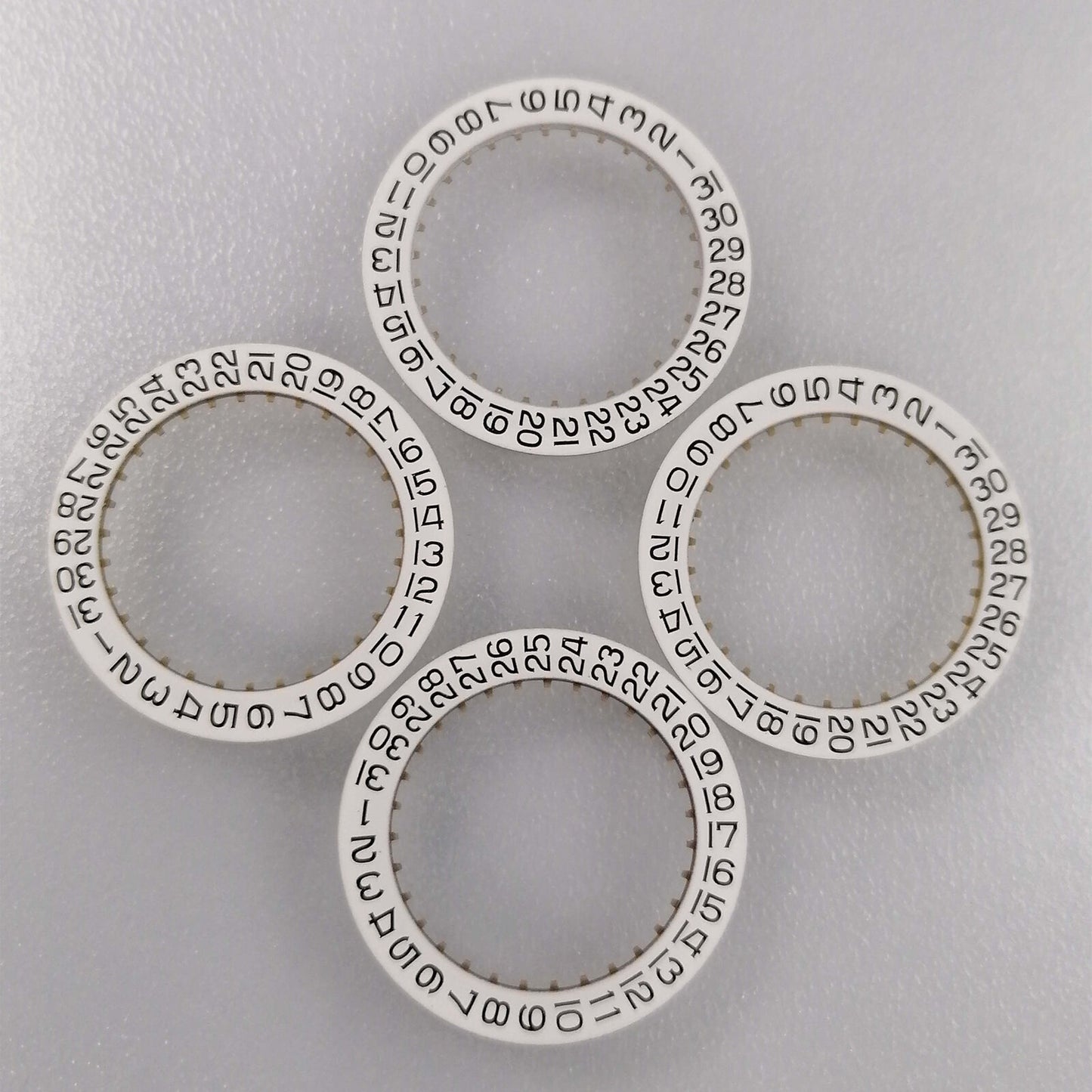 Generic white replacement date disk wheel for ETA2836 watch movement with date display at 3 o'clock.