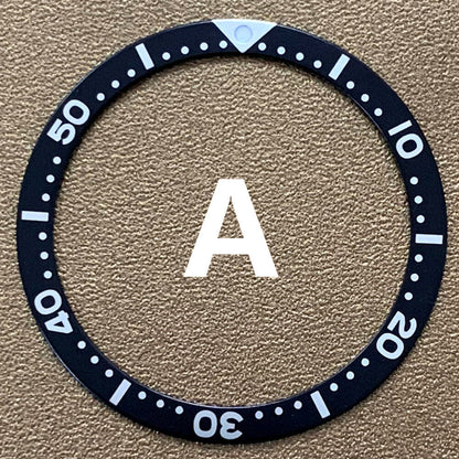 39mm green, blue, and black aluminum bezel inserts for watch repair and customization.