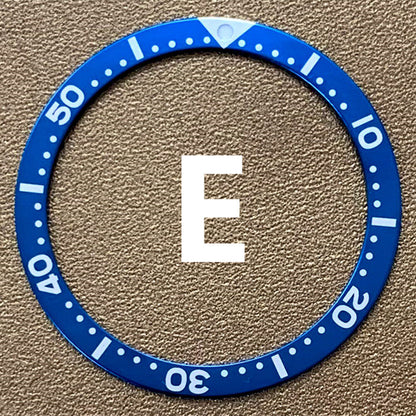 39mm aluminum bezel inserts in green, blue, and black for watch customization and repair.