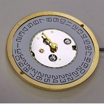 ISA 220 golden quartz watch movement with calendar, 2-hand design, ideal for men's Watchmakers timepieces.