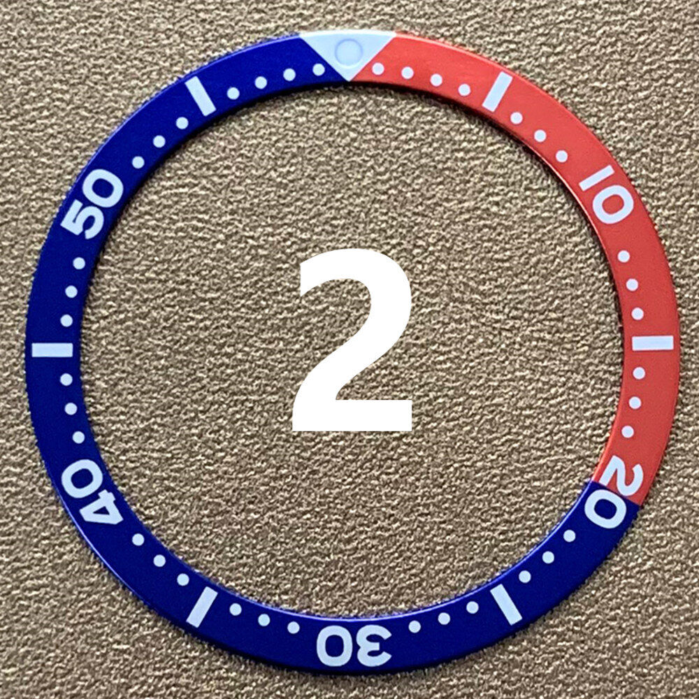 Red, blue, and black aluminum bezel insert for 39mm/32mm watches, adds vibrant style and durability.