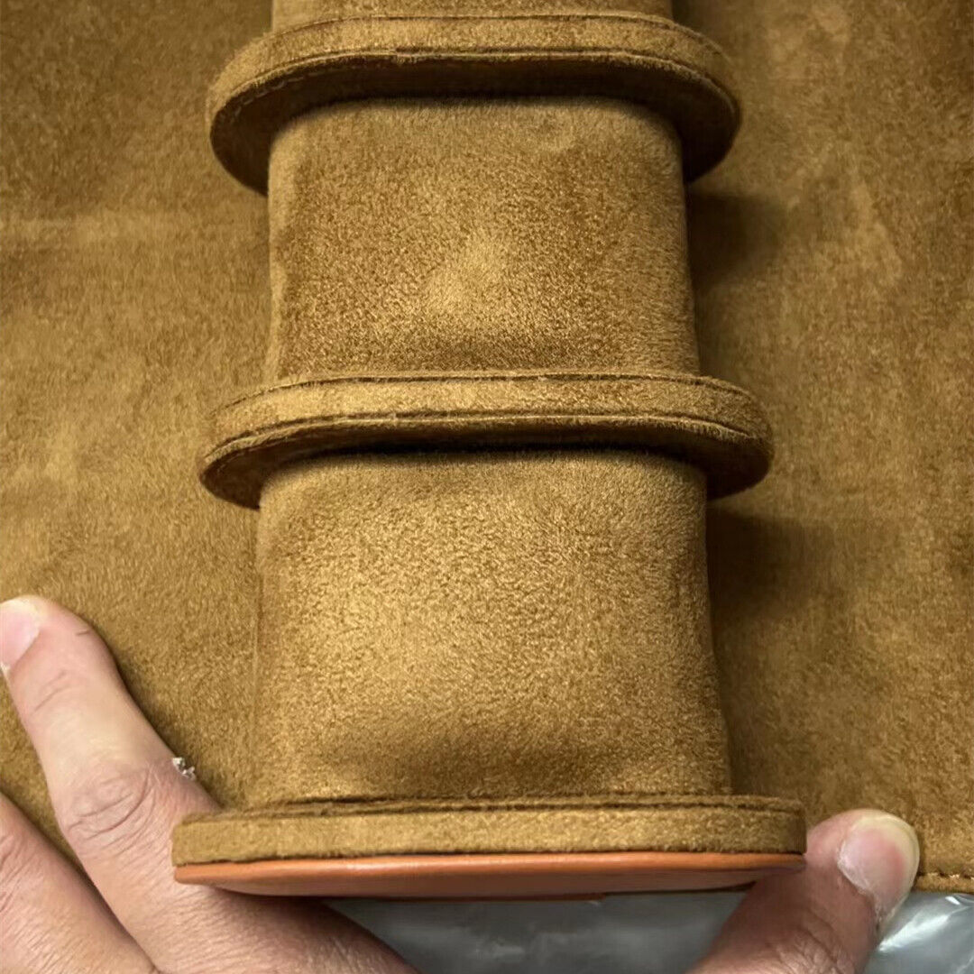 Brown leather travel watch case roll, secures 3 watches, perfect for travel and stylish protection.