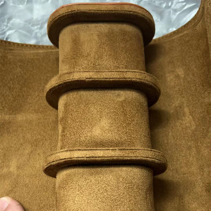 Brown leather travel watch case roll, stores 3 watches securely for stylish on-the-go protection.