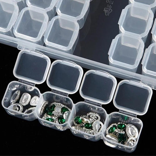 Clear 28-grid 11x17cm mini toolbox, perfect for organizing small watch accessory parts.