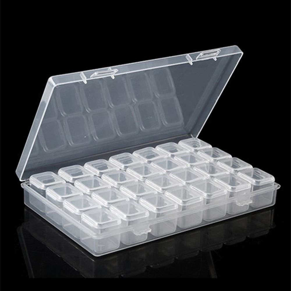 Clear 28-grid 11x17cm mini toolbox, ideal for storing watch accessory components neatly.
