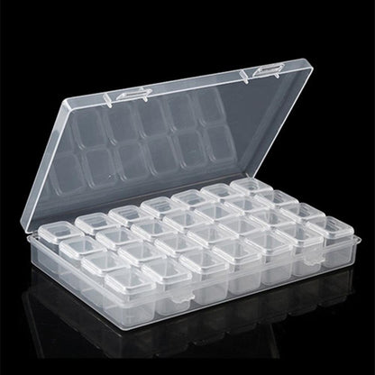 Clear 28-grid 11x17cm mini toolbox, ideal for storing watch accessory components neatly.