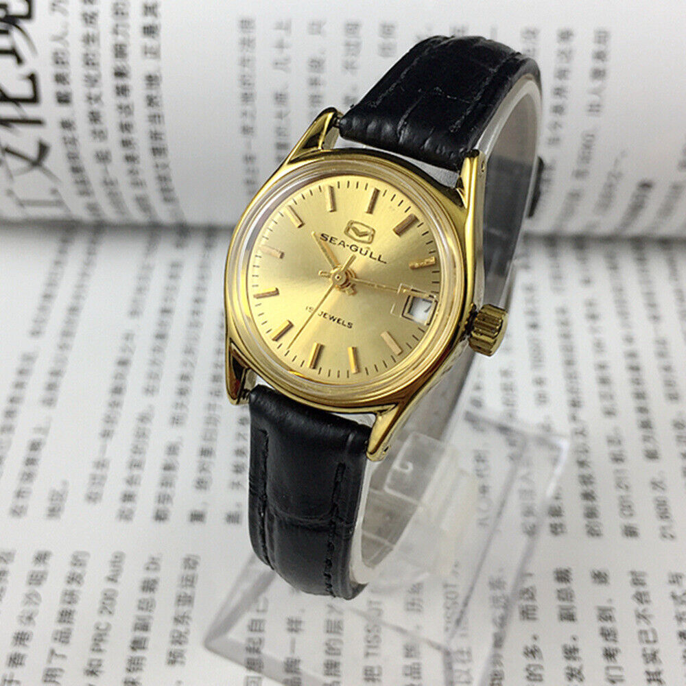 Golden dial Seagull Lady Watch with 19 jewels, manual mechanical movement from Tianjin Factory, elegant design.