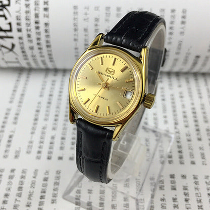 Golden dial Seagull Lady Watch with 19 jewels, manual mechanical movement from Tianjin Factory, elegant design.