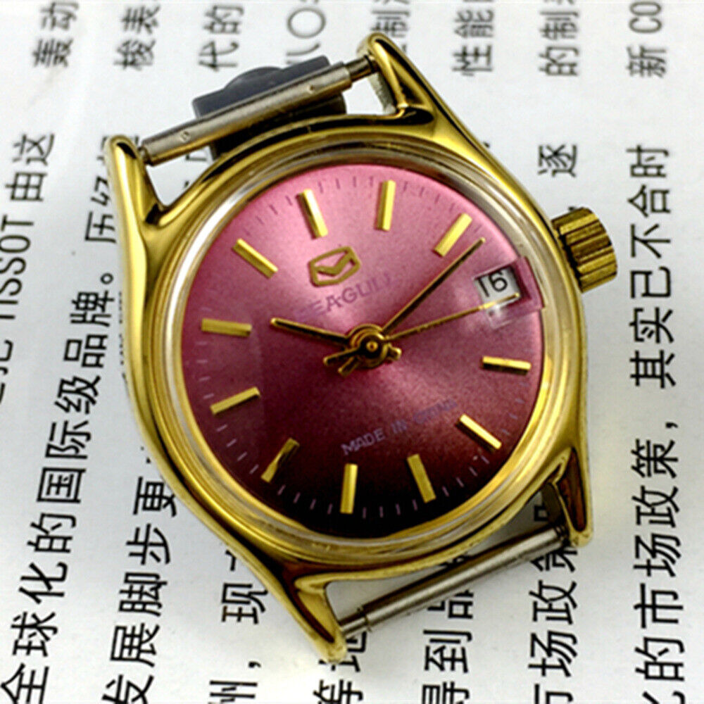 Purple dial ladies watch with golden nail markers by Tianjin Seagull, manual mechanical movement, elegant design.