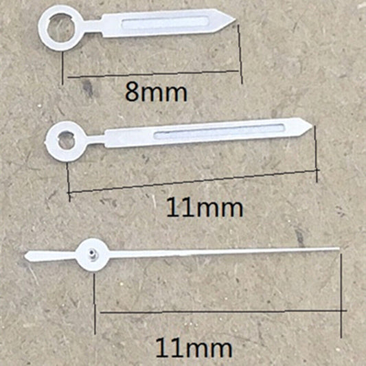 Arrow-shaped green lume watch hands with silver trim, designed for Miyota 1M12 quartz movement.