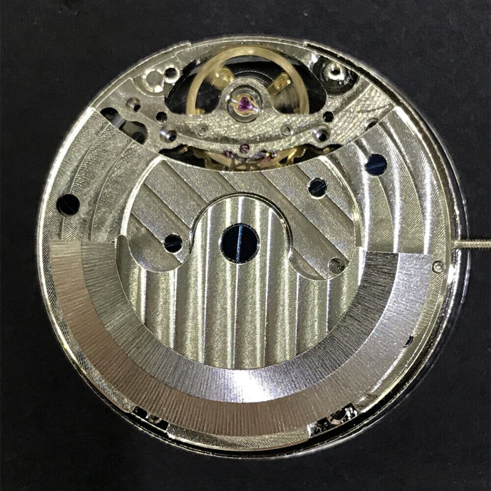 3 Hands China Made watch with hollow carved design, automatic movement, moon phase at 12 o'clock