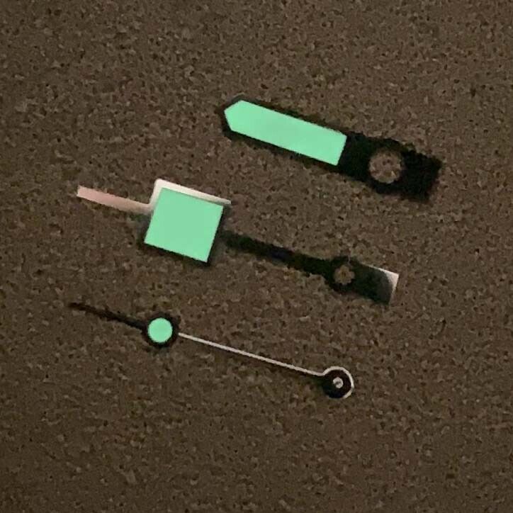 Green luminous watch set with three hands for NH35A/NH36A movement, ensuring clear visibility and accurate timekeeping.