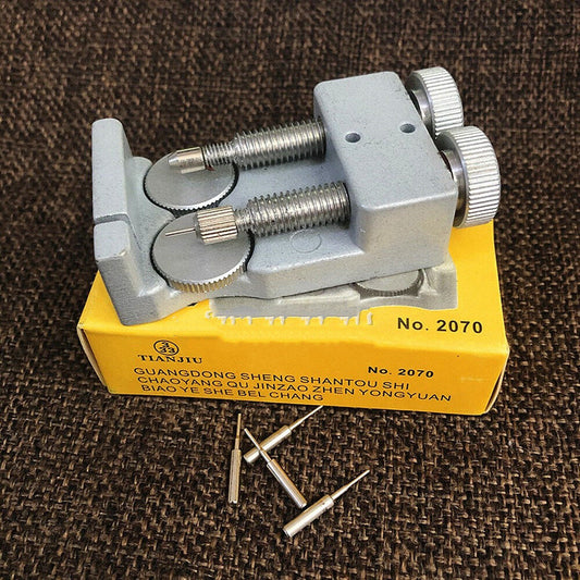 Adjustable metal watch band link remover with 4 pins for precise watch repair.