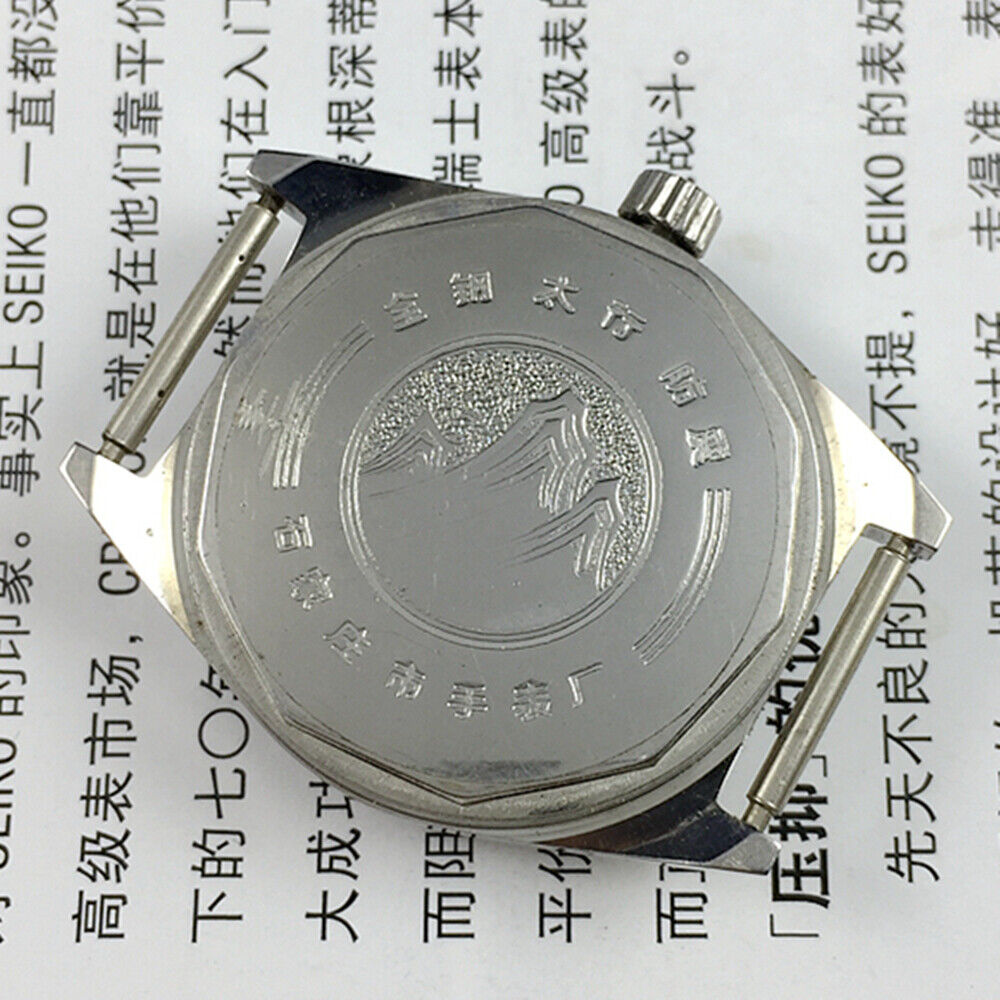 Taihang 32mm black dial manual mechanical watch with golden markers and 17 jewels for accuracy.