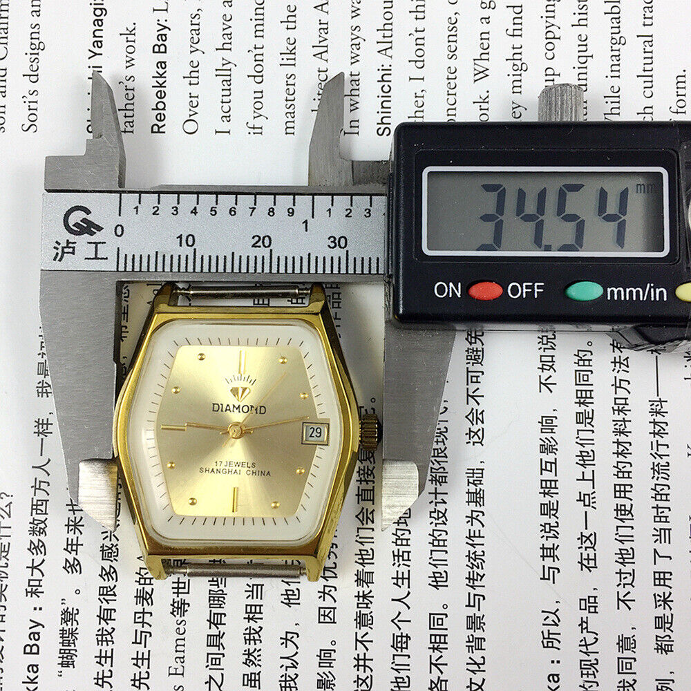 33mm Shanghai watch with diamond accents, manual movement, single calendar, 17 jewels, elegant design.