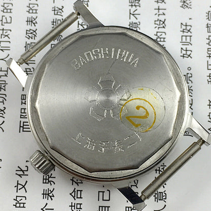33mm Shanghai manual watch with single calendar, 17 jewels, shock-resistant for durable timekeeping.