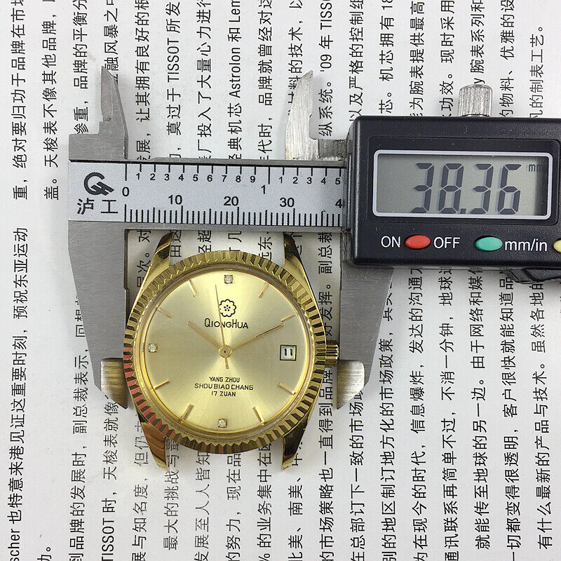 Chinese Qionghua men's manual mechanical watch with 17 jewels, golden dial, and single calendar display on leather strap.