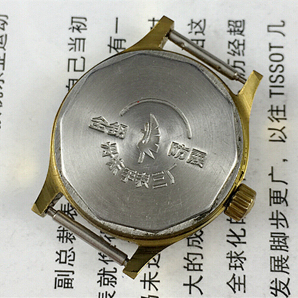 27mm Kongque manual mechanical watch with silver dial, golden markers, 19 jewels, showcasing classic Chinese craftsmanship.