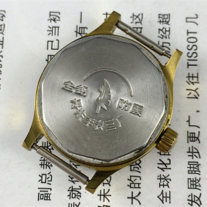 27mm Kongque manual mechanical watch with silver dial, golden markers, 19 jewels, showcasing classic Chinese craftsmanship.