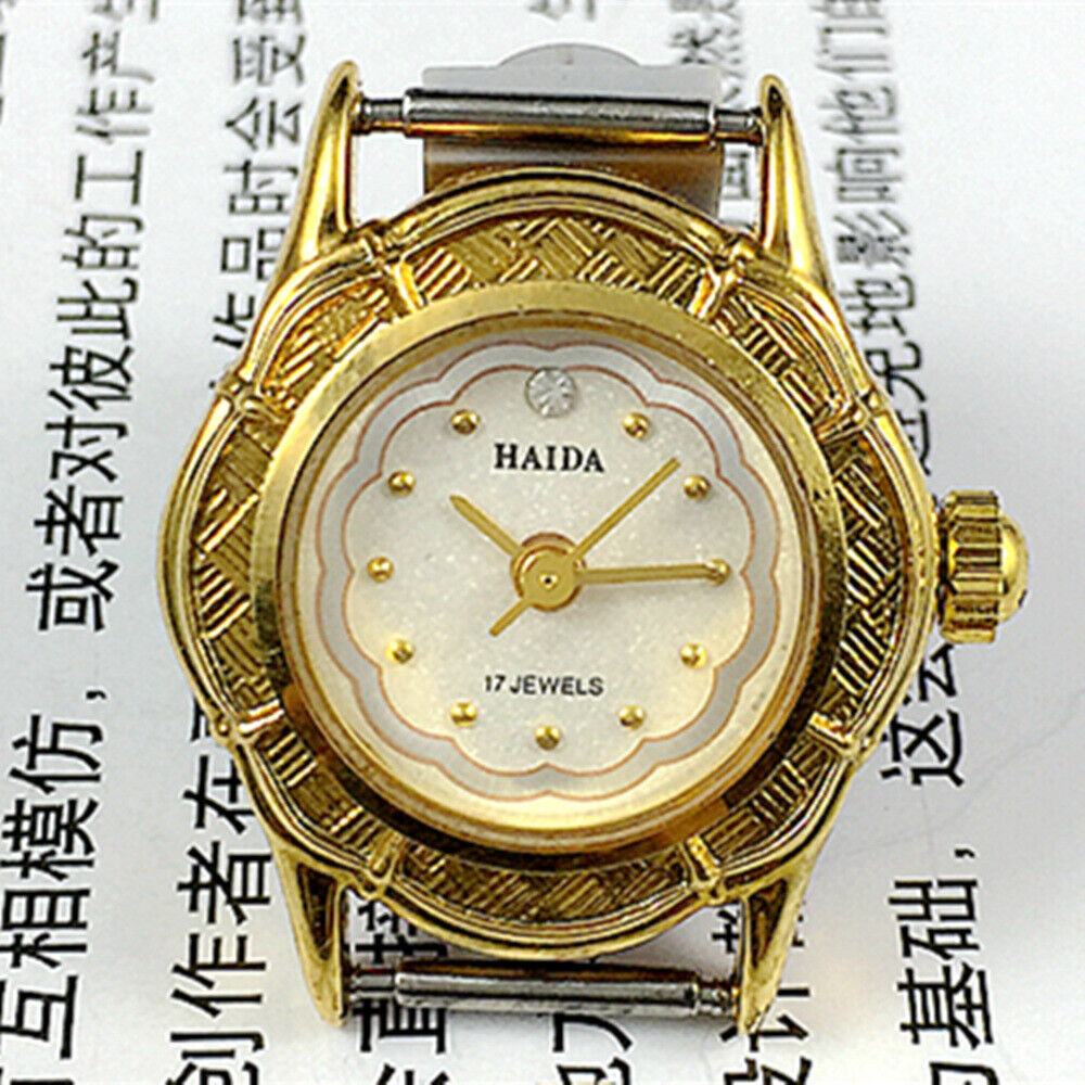Classic 21mm Shanghai Made Lady watch with white dial, golden nails, manual mechanical movement, 17 jewels.