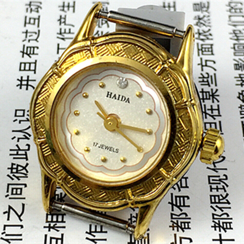 Classic 21mm Shanghai Made Lady watch with white dial, gold markers, manual mechanical movement, 17 jewels.