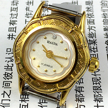 Classic 21mm Shanghai Made Lady watch with white dial, gold markers, manual mechanical movement, 17 jewels.
