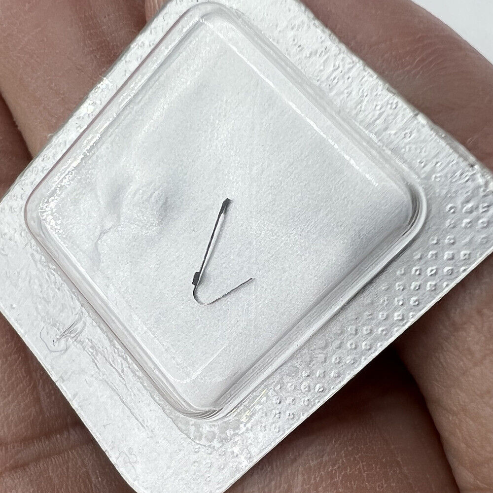 Swiss ETA C01.211 self-winding spring click watch part, precision disassembled component for repairs.