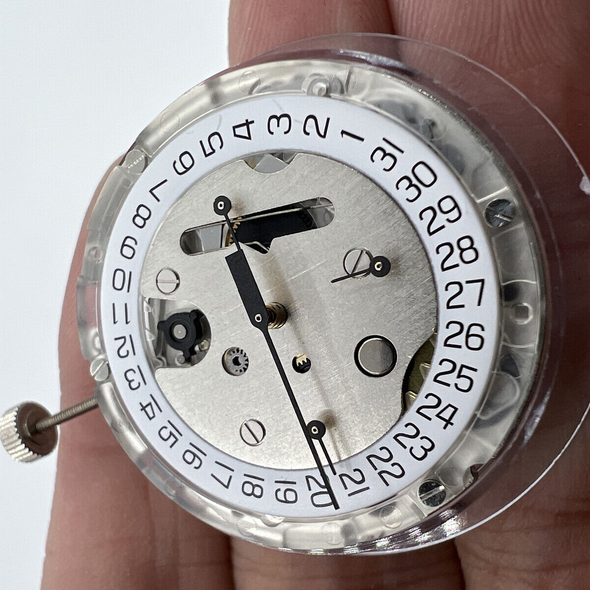 Swiss Made ETA C01.211 chronograph movement with white dial, precision mechanical watch component by 1853.