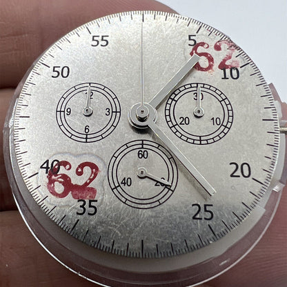 Asian 7750 automatic chronograph movement with ETA 7753 configuration showing detailed watch mechanism at 3, 6, and 9 o'clock positions.