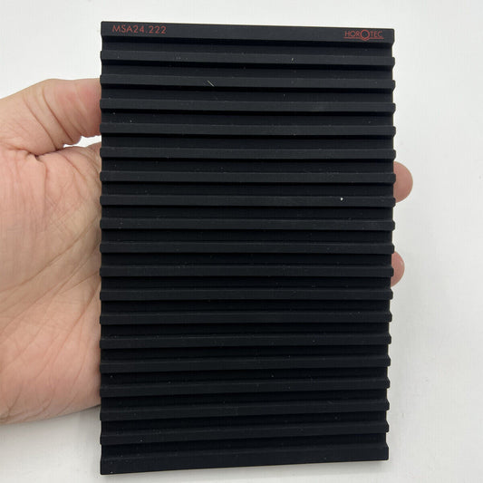 Horotec MSA24.222 black silicone bench mat with 19 grooves for secure watch repairs and parts organization.