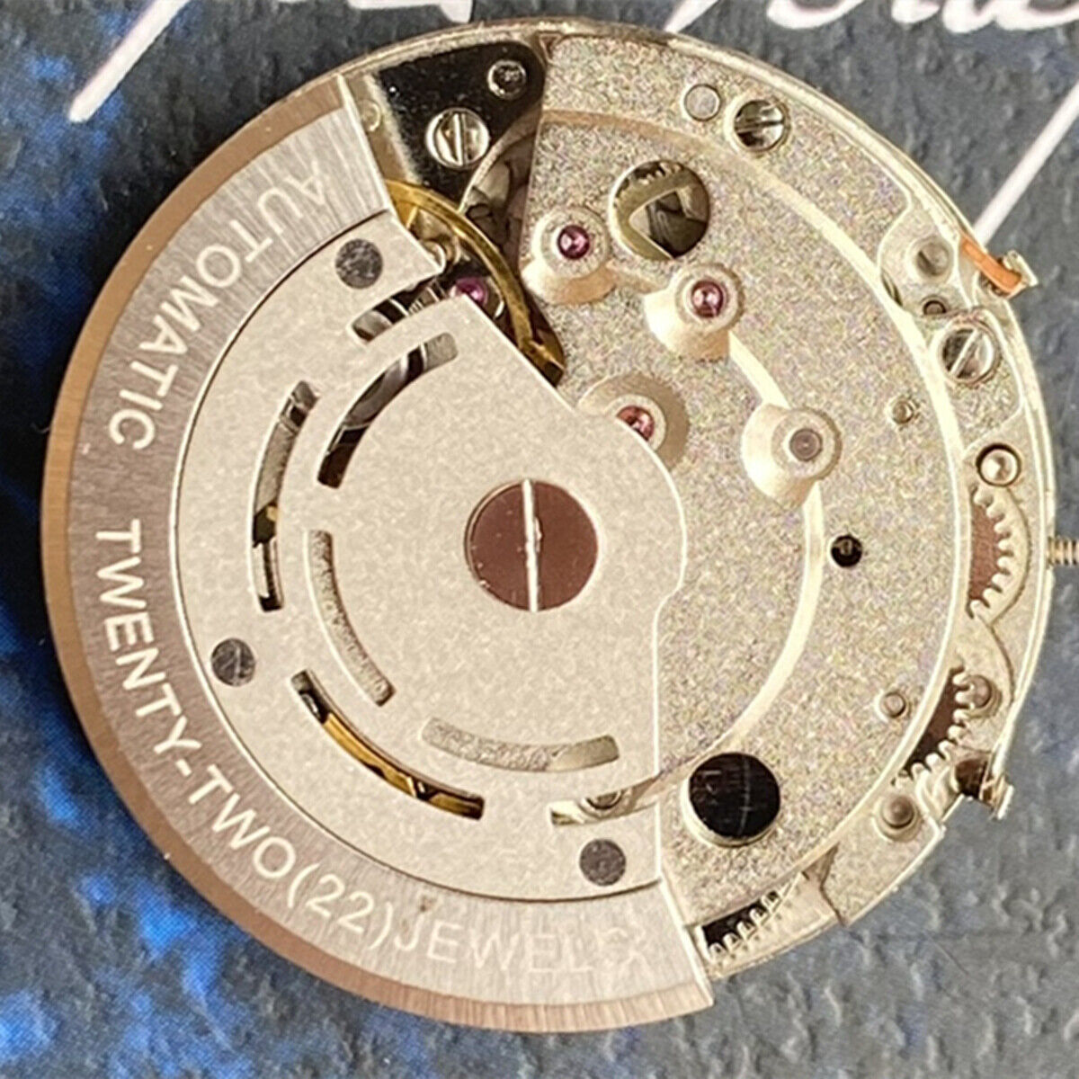 China Made 8205 2813 automatic mechanical watch movement with single calendar, precision engineering.
