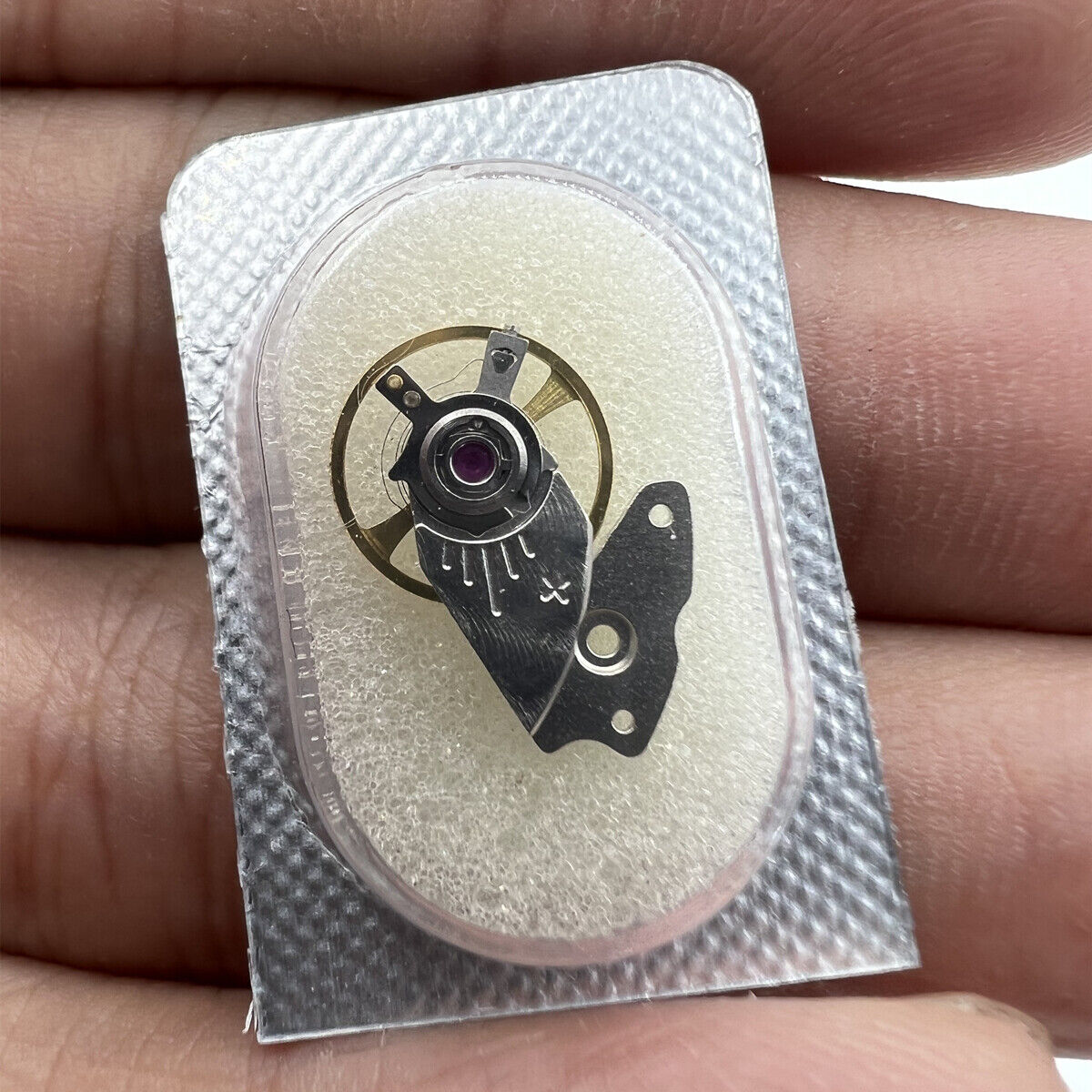 Japan-made Miyota 9015 watch balance wheel with splint, precision part for smooth timekeeping.