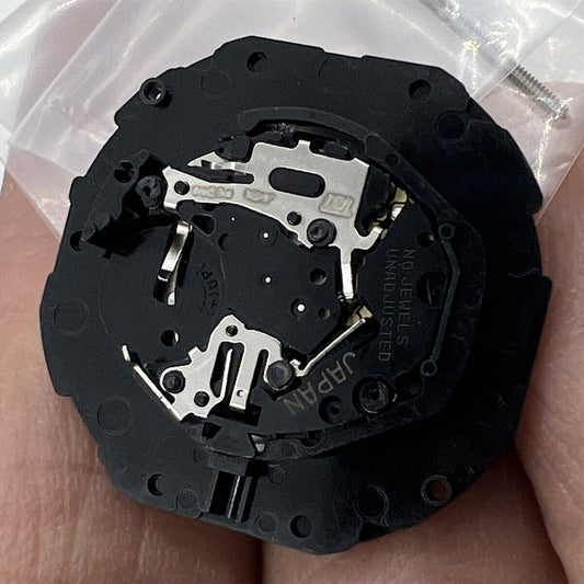 Hattori Epson TMI PC39 quartz watch movement, precision Japan-made component for watch repair.