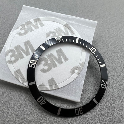 37.5mm green lume aluminum bezel with black base and silver SUB font, ideal for Rolex watch upgrades.