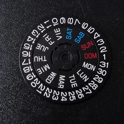 NH36 watch movement with hand-held calendar date disc wheel and day match features.