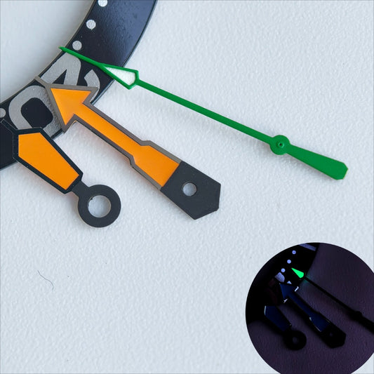 Dark grey and orange painted watch hands with green lume for NH35/36 movement, enhancing visibility and style.