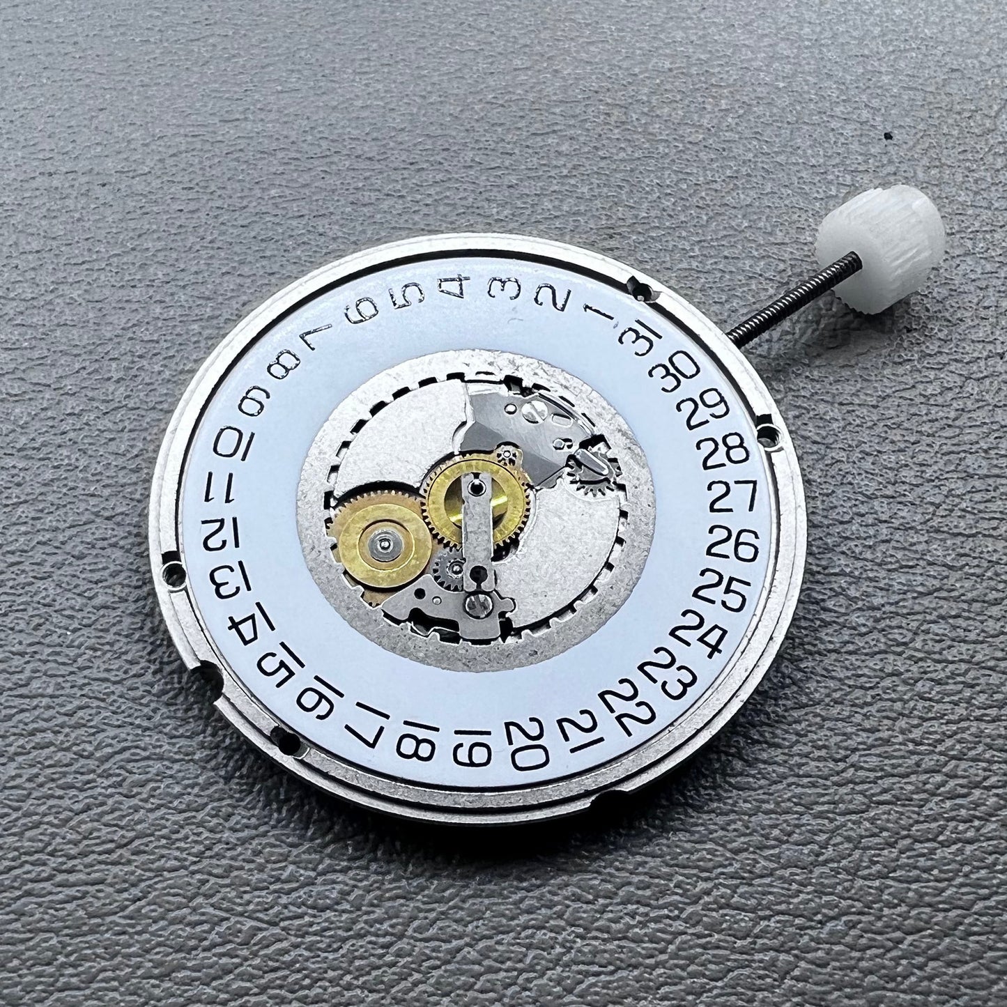 Swiss ETA 955.114 quartz movement with 3 hands for precise watch accessory replacement.