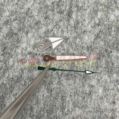 Green luminous watch hands with black, silver, and golden trim for NH35/NH36 movement,, enhancing style and readability.