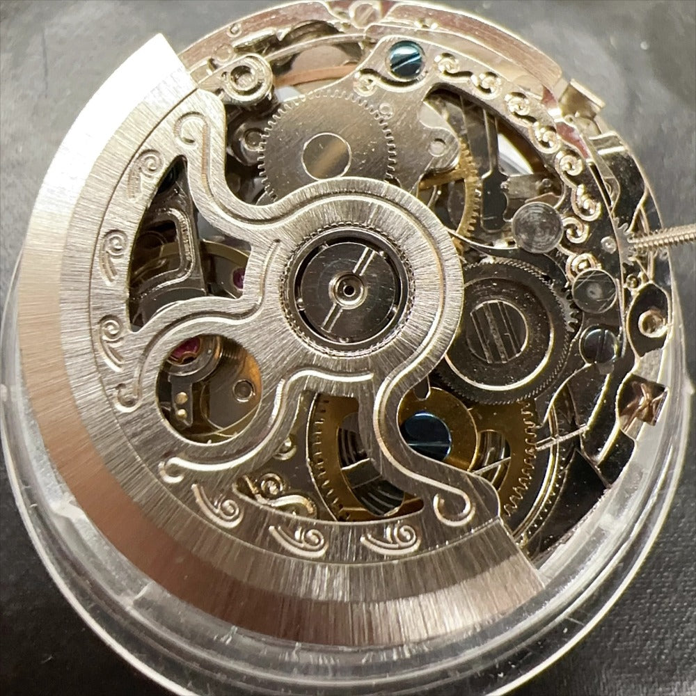 Silver hollow watch part with Hangzhou 2189 automatic movement, China-made for precise mechanical repair.