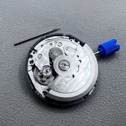 Seiko NH35A watch movement with black dial, 24 jewels, and date display at 6 o'clock for watch repairs.