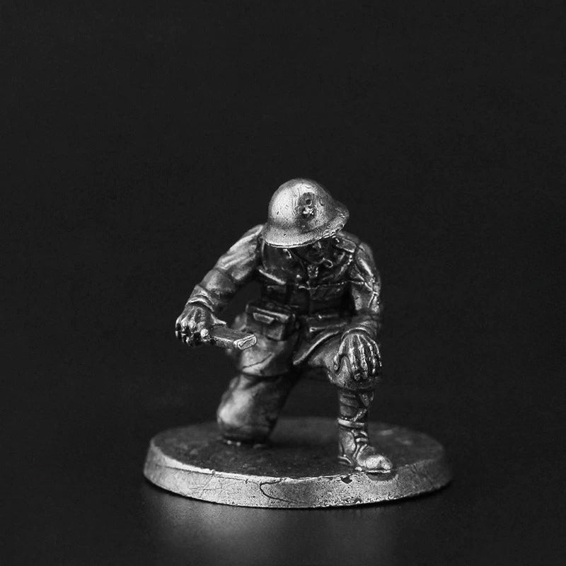 White Brass Figurine WWII Grenadier Miniature - Crouching Holding Grenade Figure