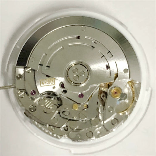 Shanghai 4130 automatic watch with small second hand at 3, 6, and 9 o'clock positions, China-made precision.